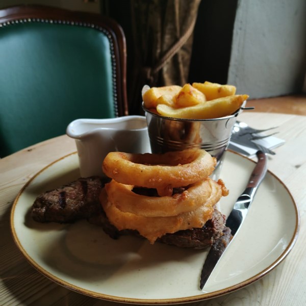 An image labelled Friday Steak Night Special 1 B&B With a Bottle of Wine £149 for 2 People
