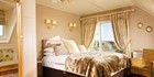 An image labelled Rooms that epitomise Luxury & Comfort