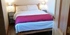 An image labelled Apartment 303 - Double bed.
