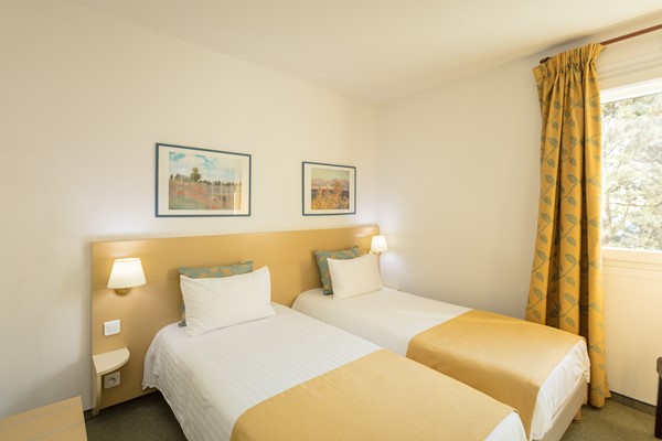 An image labelled Twin Comfort Room