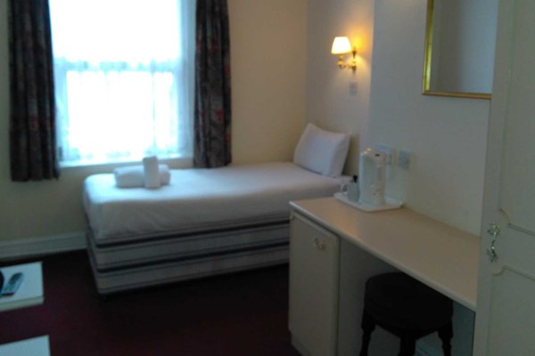 An image labelled Lodge Twin Room