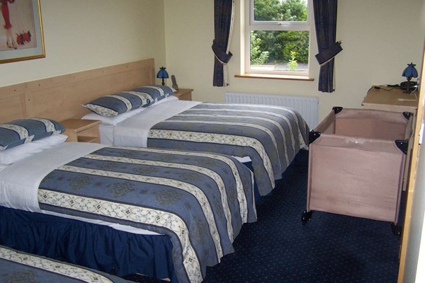 An image labelled Double and Single Triple Room