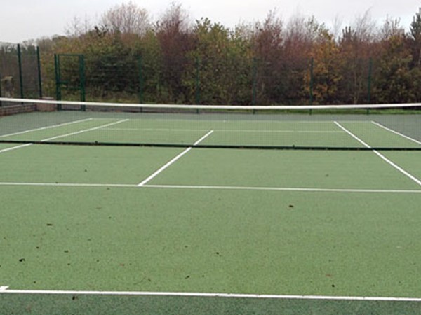 An image labelled Terrain de tennis