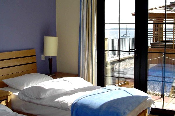 An image labelled Twin Harbour View Room