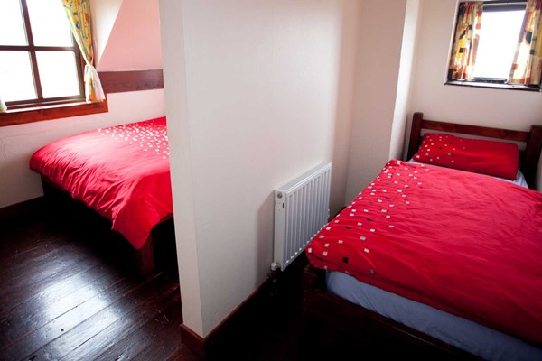 An image labelled Deluxe Double and Single Room