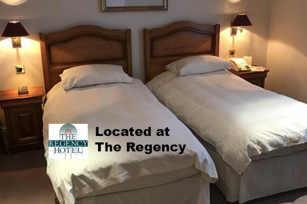 An image labelled Luxury Twin Room