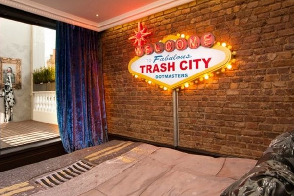 An image labelled Trash City Suite Room