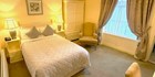 An image labelled Bright and Comfortable Double Room