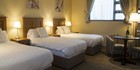 An image labelled Enjoy our stunning Rooms & Facilities