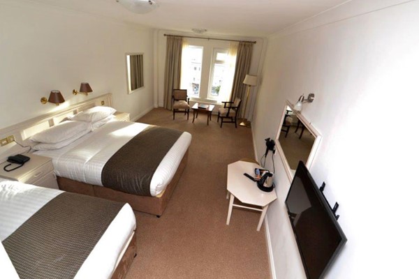 An image labelled Double & Single Deluxe Room