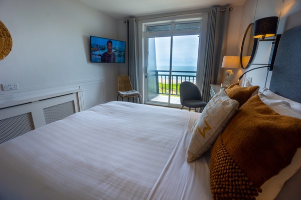 An image labelled Sea View & Balcony Double Room