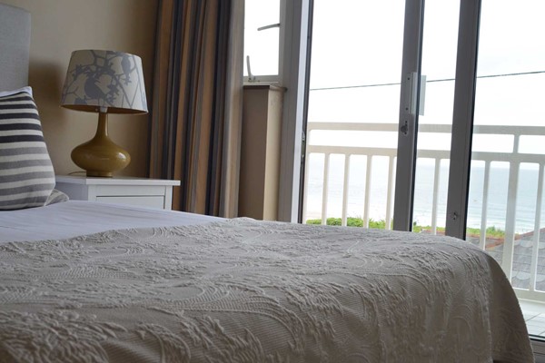 An image labelled Sea View & Balcony Double Room