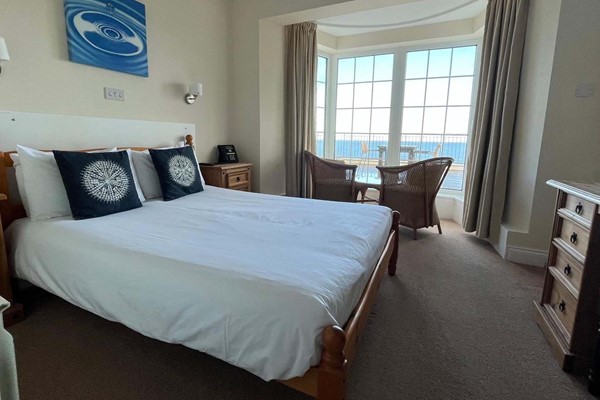 An image labelled Double Room with Sea View and Balcony Room