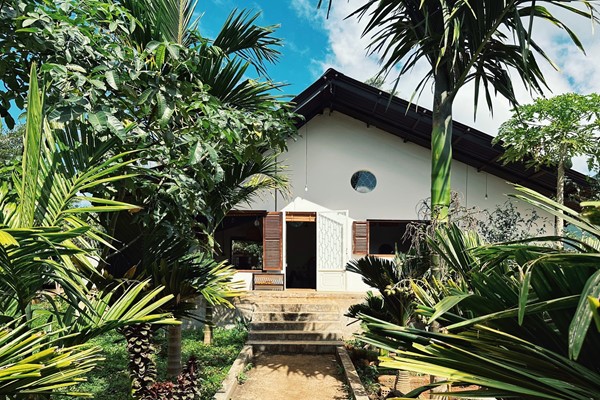 An image labelled Phòng có 1 Giường Đôi và 4 Giường Đơn - Fullhouse - XOM Organic Farm Stay