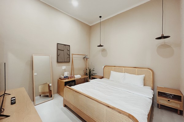 An image labelled Double - Phòng 1 (Standard) - XOM House Biển Hồ Room